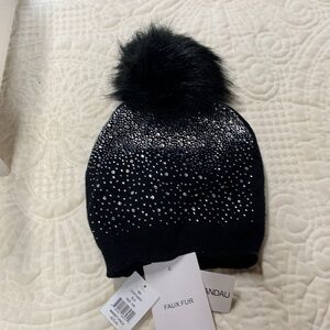 Said Fifth Ave designer hat